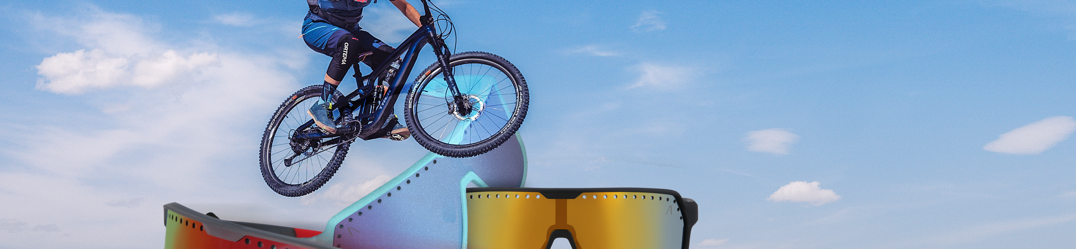 Sporty presentation with a mountain biker and a collection of Athletes Eyewear glasses